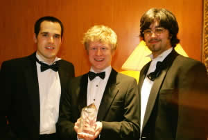 Joomla leadership accepts award for best open source project.