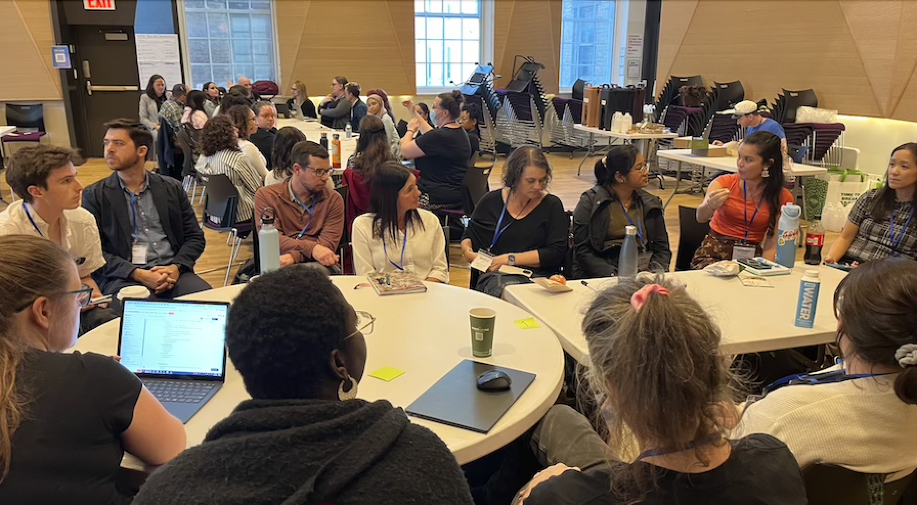 A group of folks gathered around a table at NPSP Day New York