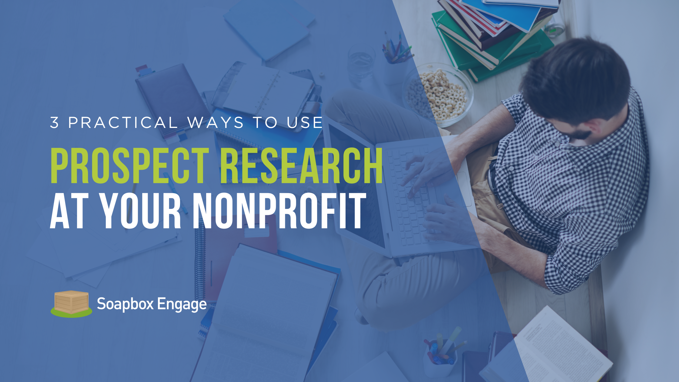 Nonprofit development staff reviewing prospect research data at a desk